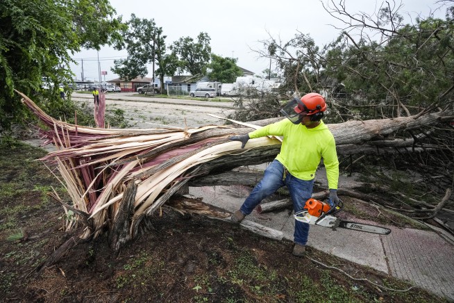 Some in Houston facing no power for weeks after storms cause widespread damage, killing at least 4