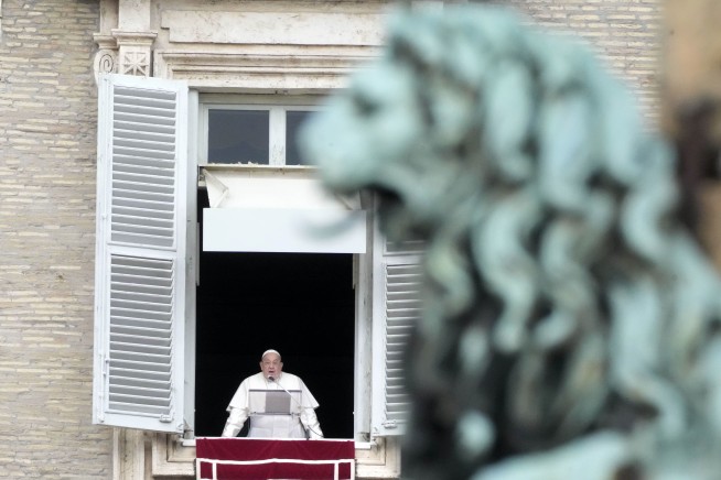 Pope Francis baptizes 21 babies in an annual ceremony at the Sistine Chapel