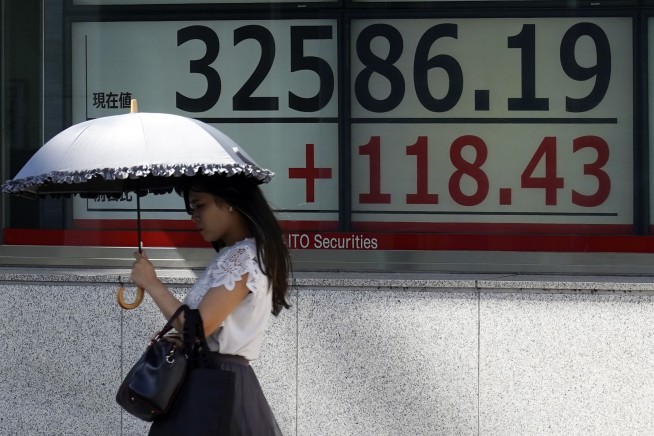 Stock market today: Asian shares mostly slide despite Big Tech rally on Wall Street