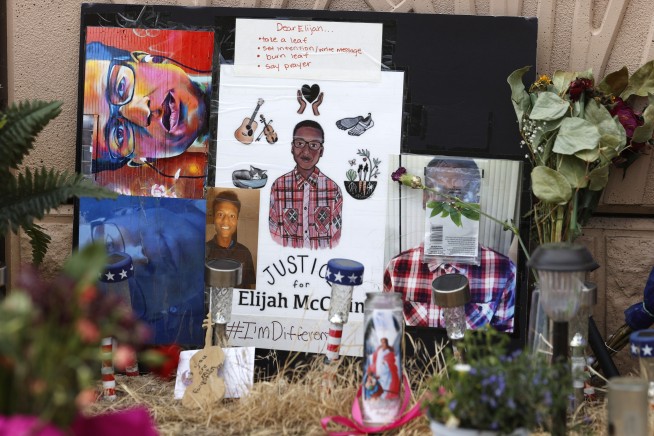 Cops fired over photos of chokehold used on Elijah McClain