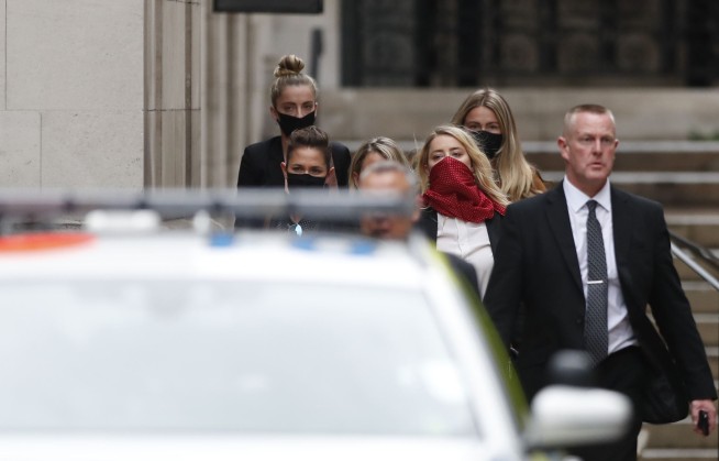 In court, Depp denies violence during 'tailspin' marriage