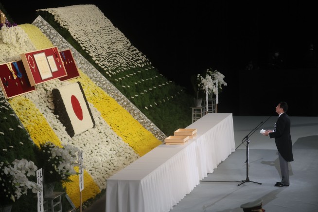 Japanese former leader Abe honored at divisive state funeral