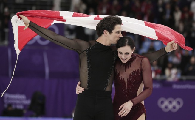 Virtue, Moir win ice dance for 3rd career Olympic gold medal