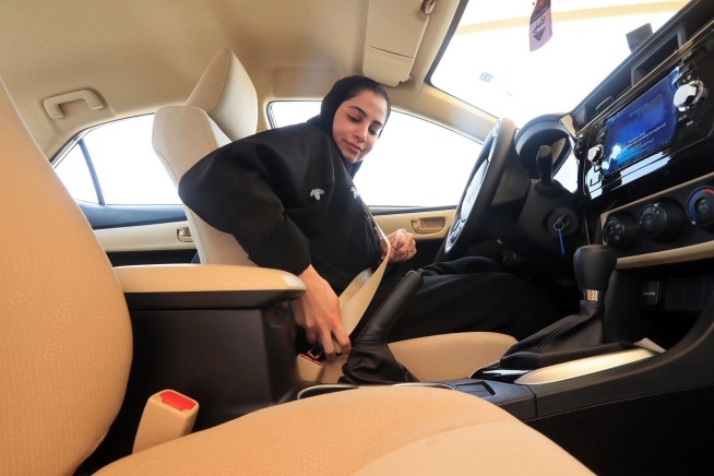 First Saudi women receive driving licenses amid crackdown