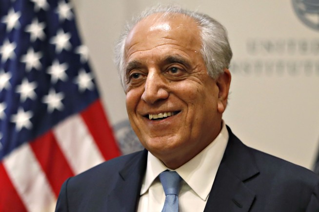 US starts troop pullout, seeks end to Afghan leaders' feud