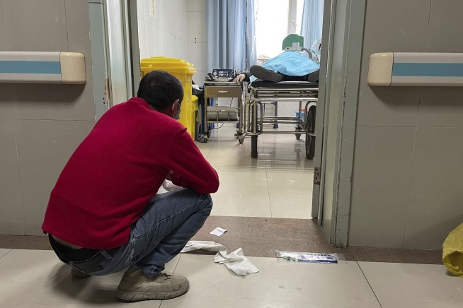 'A very hard road ahead' for China as COVID-19 cases spiral