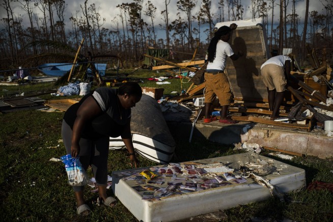 US emergency workers recover more bodies in Bahamas