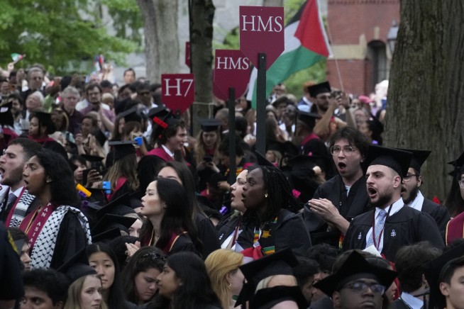 Group of graduates walk out of Harvard commencement chanting 'Free, free Palestine'