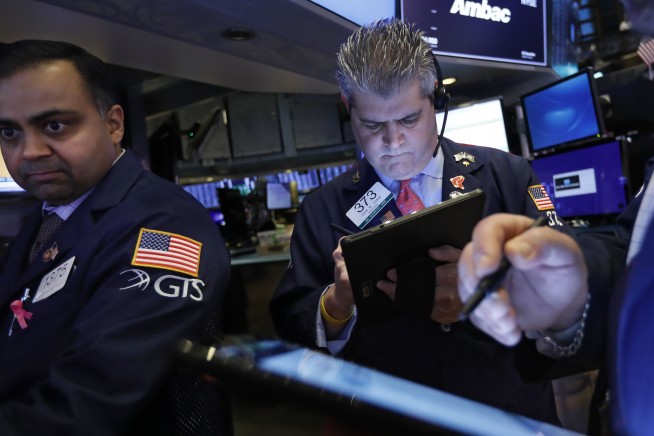 US stocks end a choppy day mostly lower as jitters return