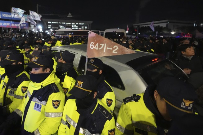 South Korea’s opposition parties move to impeach president over sudden declaration of martial law