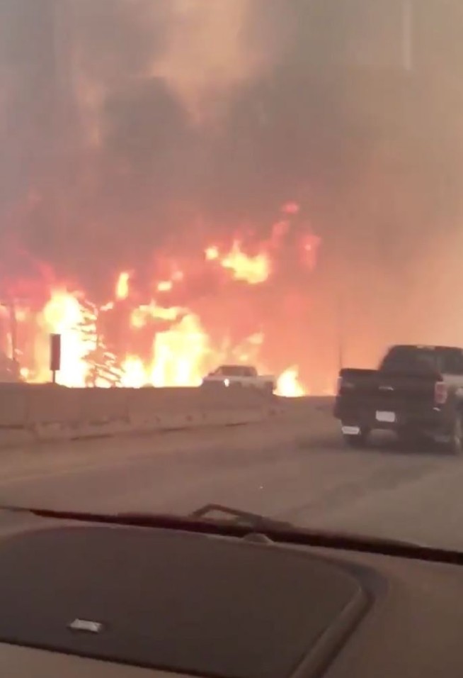 Alberta declares emergency as fires threaten Canada oil town
