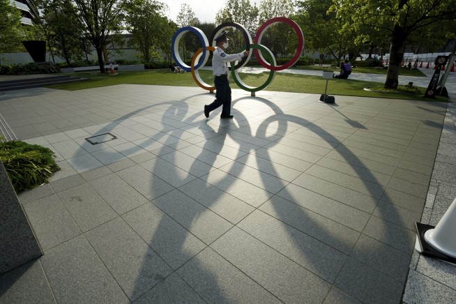 Major Japan newspaper Asahi calls for Olympic cancellation