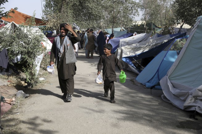 Taliban seize province near capital, attack northern city