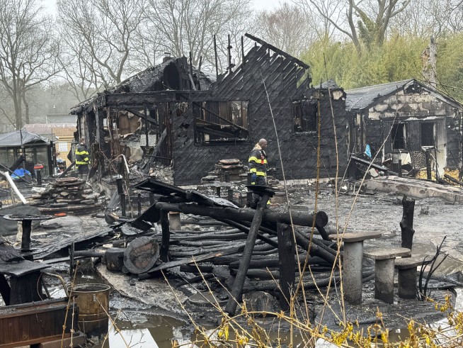 Fire kills a New York cat sanctuary founder and more than 100 rescued felines