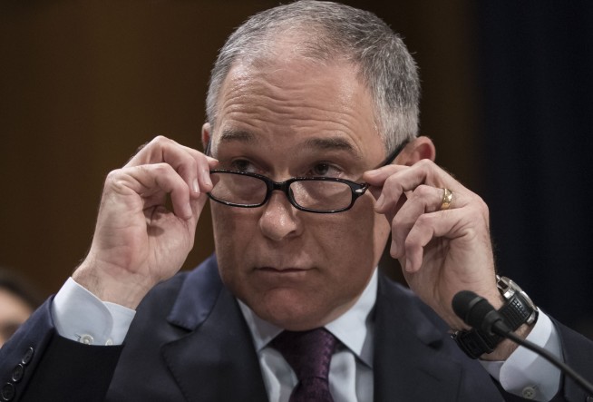 In break with Trump, EPA pick says climate change isn't hoax