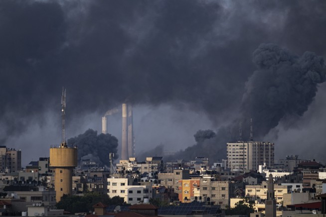 As strikes devastate Gaza, Israel forms unity government to oversee war sparked by Hamas attack