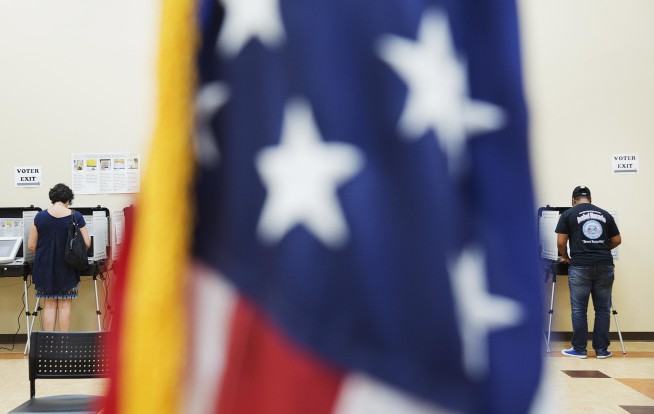 The Latest: Most polls close in Georgia House race