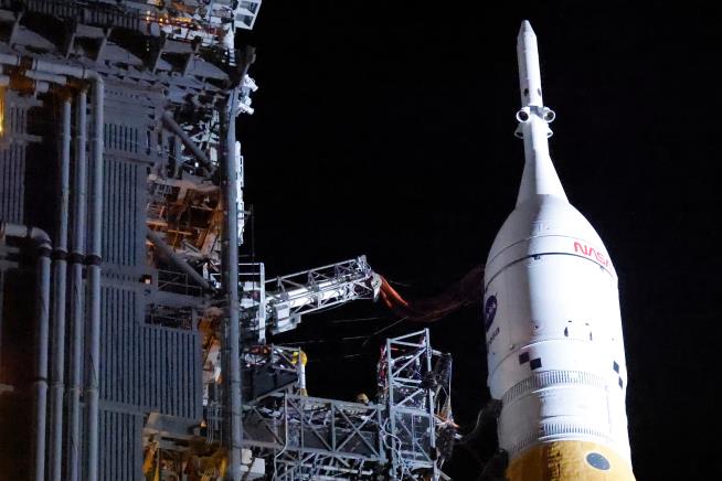 NASA hauls its repaired moon rocket from the hangar back to the pad for an early April launch