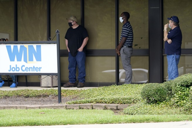 US hiring slows for 3rd month but jobless rate falls to 7.9%