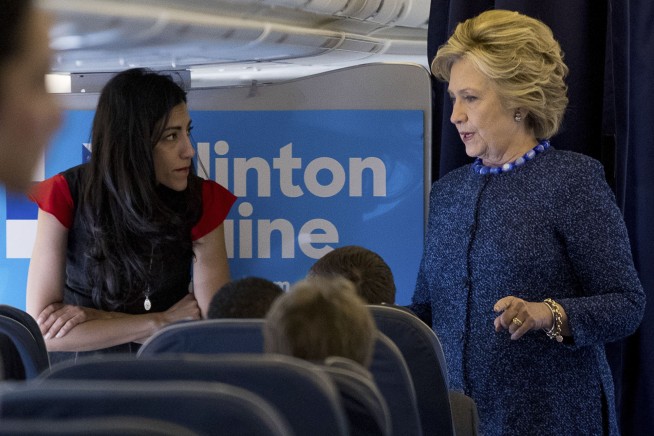 The Latest: FBI investigating new Clinton emails