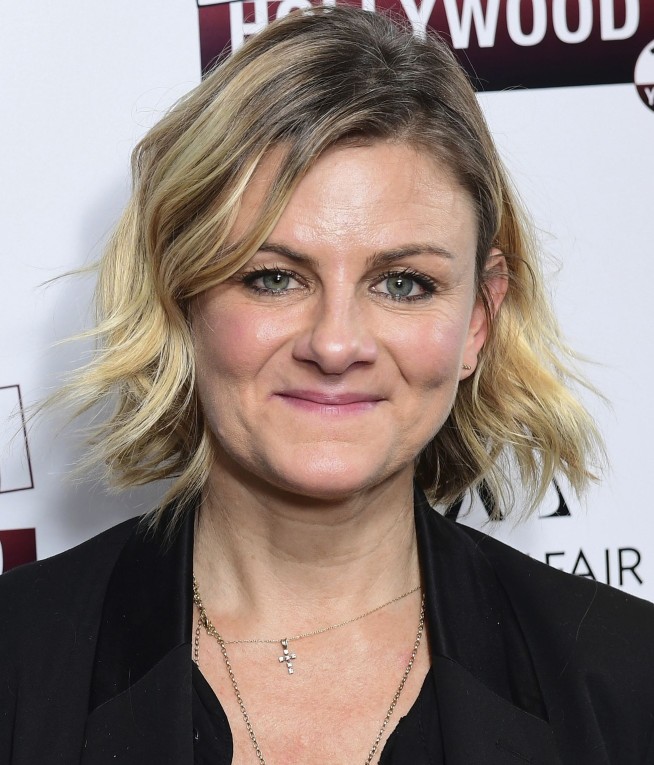 Ex-Weinstein assistant says she tried to stop him in 1998