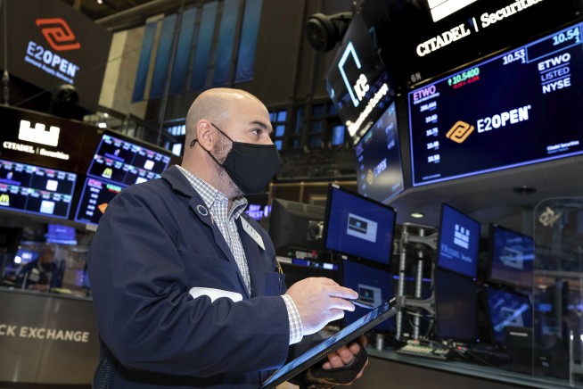 Stocks push to more gains, and record highs, on Wall Street