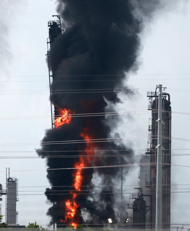 Fire at Texas Exxon Mobil refinery slightly injures 37