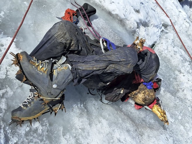 The body of an American climber buried by an avalanche 22 years ago in Peru is found in the ice