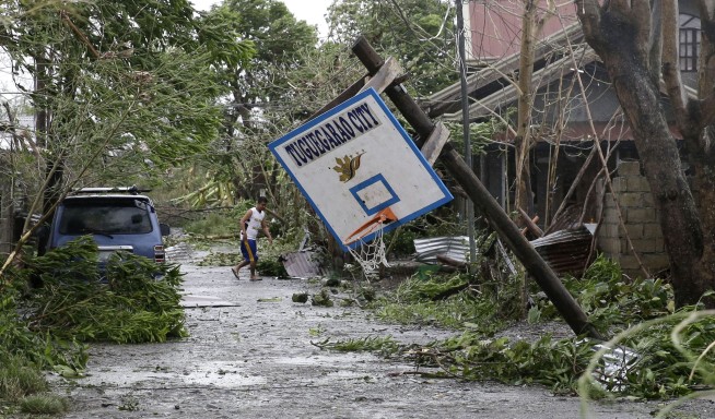 Powerful typhoon lashes Philippines, killing at least 12