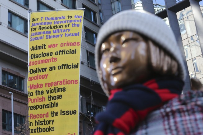 Seoul court orders Japan to compensate 12 Korean sex slaves
