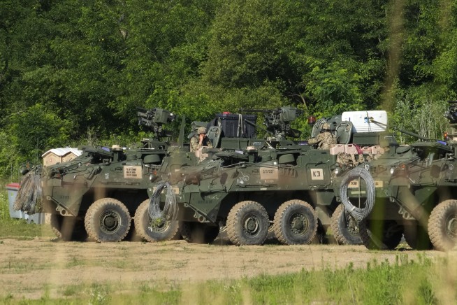 North Korea says it tested a new multiwarhead missile. South Korea says it's covering up a failure