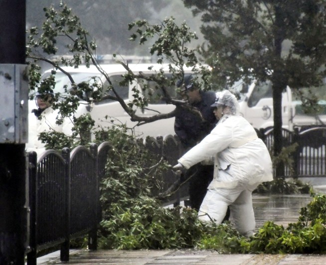 Strong typhoon slams western Japan; 2 dead, airport flooded