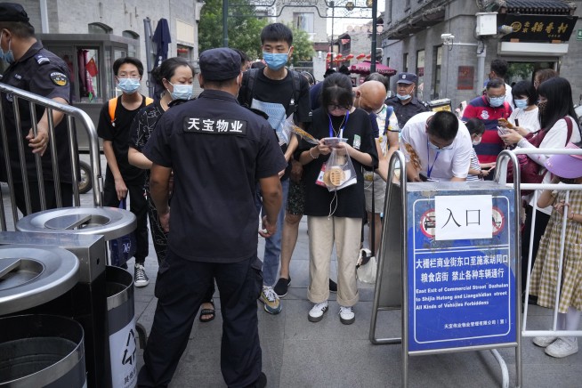 China orders mass testing in Wuhan as COVID outbreak spreads