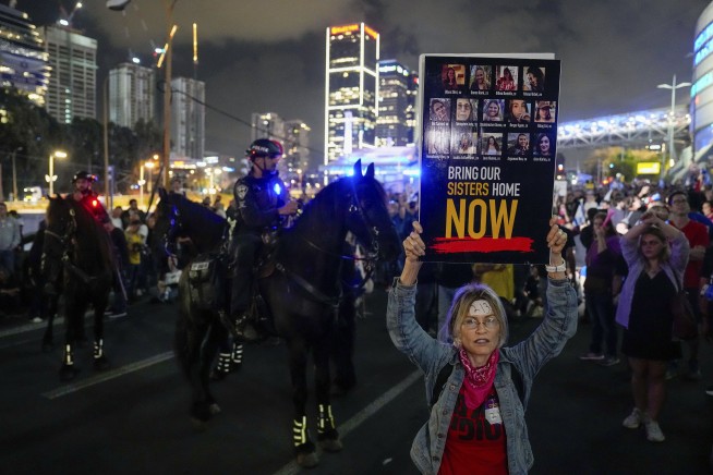 Hamas accepts Gaza cease-fire; Israel says it will continue talks but presses on with Rafah attacks