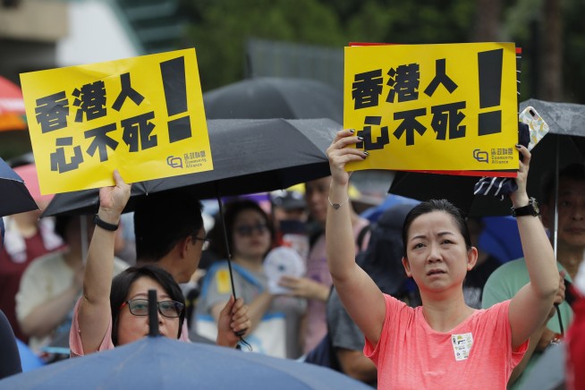 Tens of thousands flood Hong Kong park for latest rally