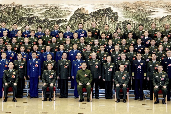 China's Xi calls for 'more quickly elevating' armed forces