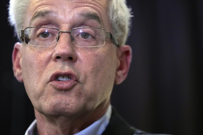 Japanese court upholds conviction of American who helped fugitive former Nissan chief hide pay