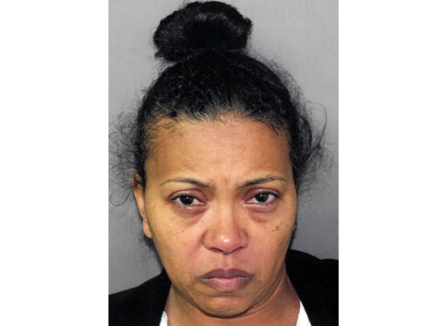 Warden at NYC federal jail charged with killing husband