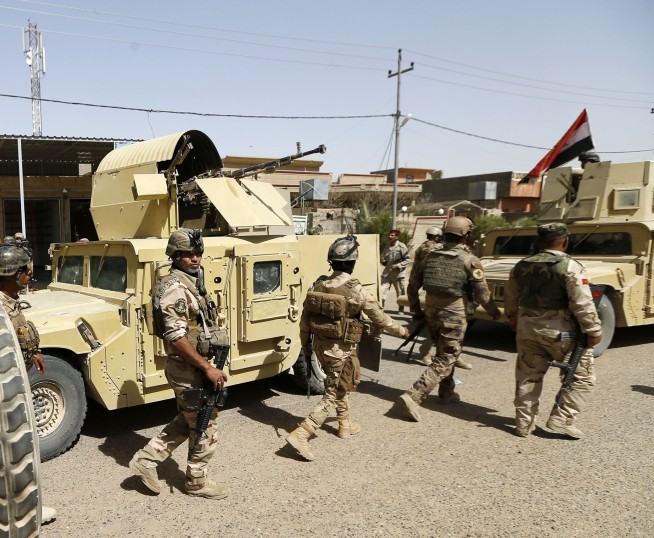 Iraqi troops clear IS mines as battle for Fallujah continues