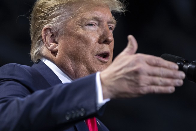 Defiant Trump rallies supporters as House impeaches him