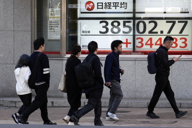 Stock market today: Asian shares track Wall Street rally as Japan's Nikkei nears a record high