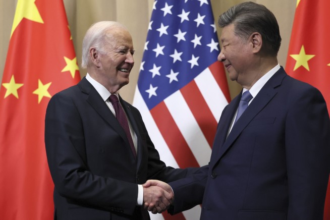 In a meeting with Biden, China's Xi cautions US to 'make the wise choice' to keep relations stable