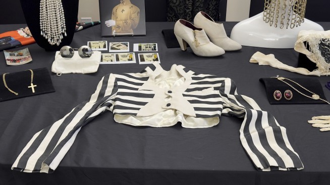 Prince's puffy 'Purple Rain' shirt and other pieces from late singer's wardrobe go up for auction
