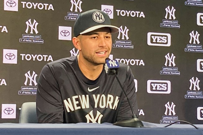 Once a ride-share driver, J.C. Escarra takes an Uber to Yankee Stadium for his first game in MLB