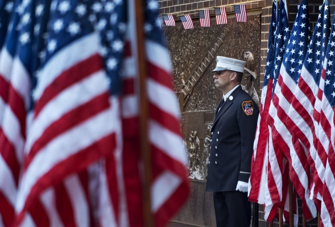 The Latest: Trump: 'America fought back' on 9/11