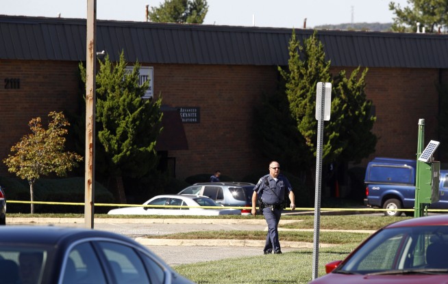 The Latest: Suspect in custody in two-state shooting spree
