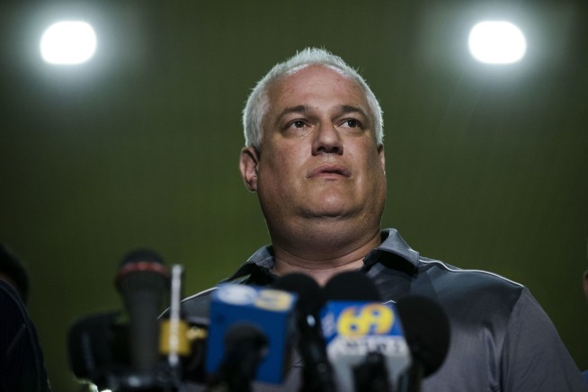 AP source: Man killed 4 men, burned bodies at family's farm