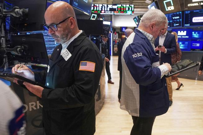 Stocks climb on hopes for lower interest rates as Dow rallies 660 points