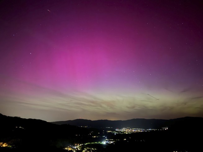 Solar storm hits Earth, producing colorful light shows across Northern Hemisphere