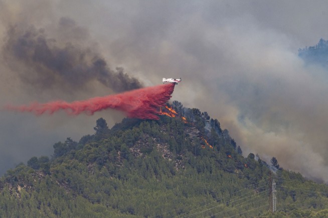 Europe broils in heat wave that fuels fires in France, Spain